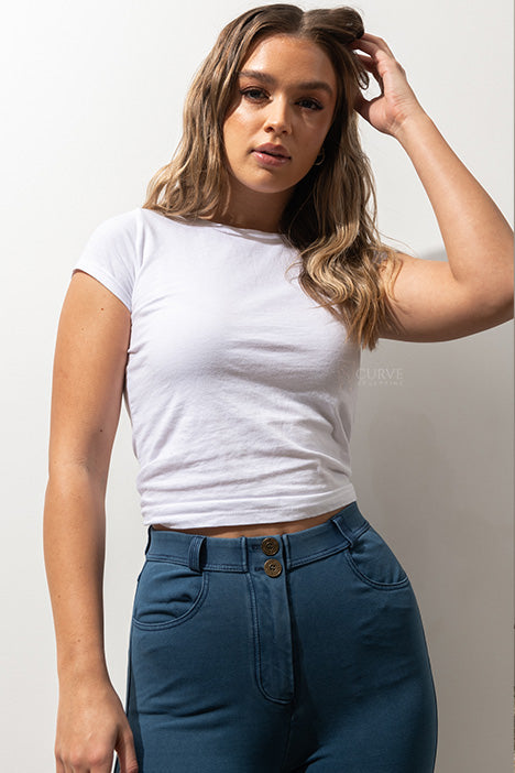 Super comfortable, stretchy and curve accentuating designed to sculpt your bum. High waistband that gives you a waist cinching affect, moulding it in all the right places. Looks like a traditional straight leg denim pant but in the worlds most comfortable Denim fabric