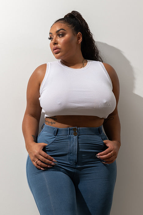 Super comfortable, stretchy and curve accentuating designed to sculpt your bum. High waistband that gives you a waist cinching affect, moulding it in all the right places. Looks like a traditional straight leg denim pant but in the worlds most comfortable Denim fabric